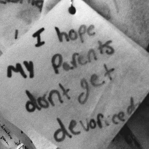 Close-up of hand written Wall of Hope card
